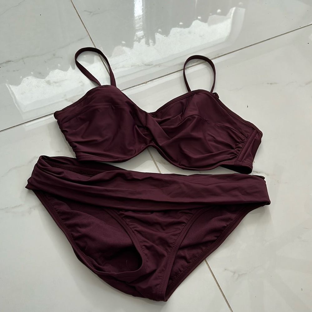 Sunset’s burgundy bikini in good condition.